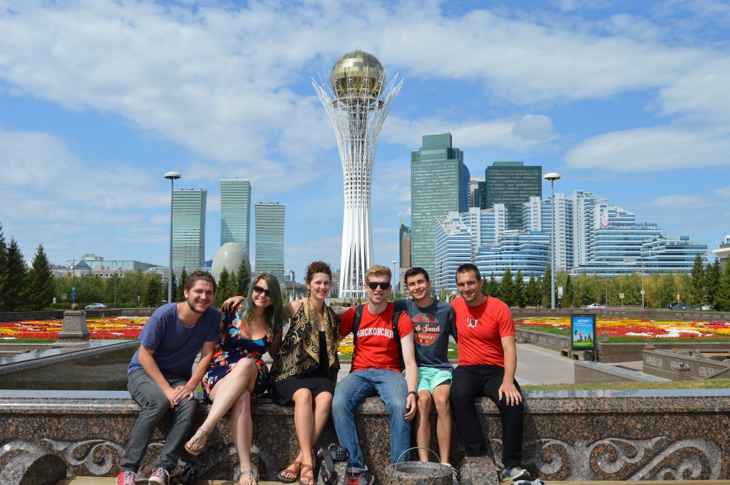 Students in front of Bayterek Tower in Astana, Kazakhstan.
